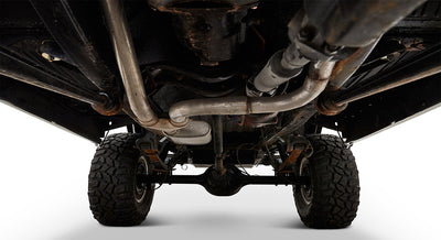 Undercarriage view of Classic Ford Bronco including suspension and exhaust pipes