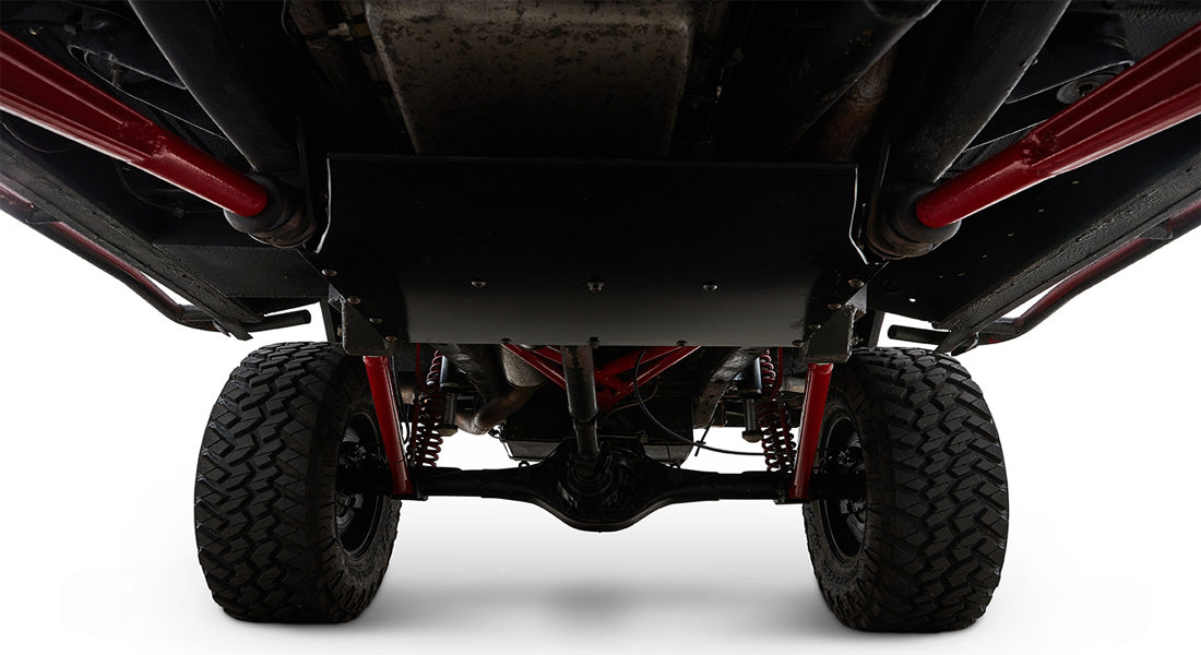 Undercarriage view of a Classic Ford Bronco showing suspension and tires