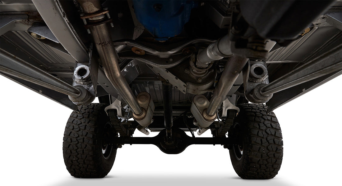 Bottom chassis view highlighting suspension and exhaust system of a Classic Ford Bronco