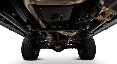 Undercarriage view of Classic Ford Bronco showing black frame, differential, and exhaust system.