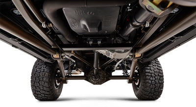 View of underside of Classic Ford Bronco showing suspension, exhaust, and drivetrain components