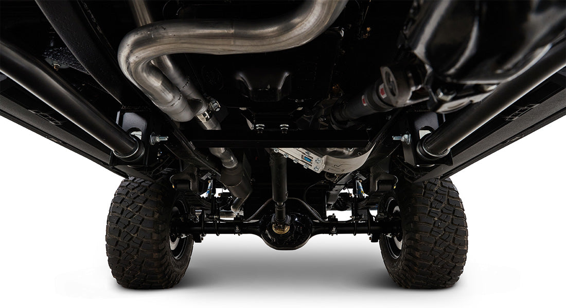 Undercarriage view showing suspension and tires of a Classic Ford Bronco