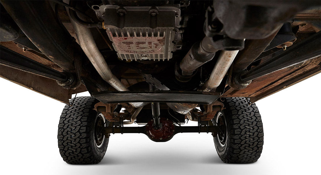 View of Classic Ford Bronco undercarriage showcasing exhaust and suspension components