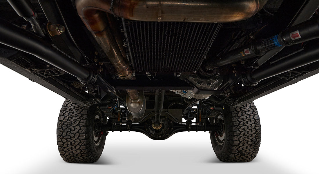 Undercarriage view showing exhaust system, axle, and suspension of Classic Ford Bronco