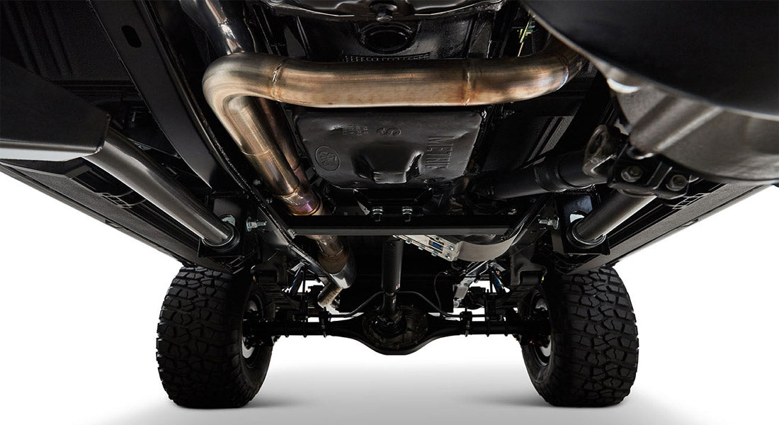 Undercarriage view showing exhaust system and rear axle components of Classic Ford Bronco