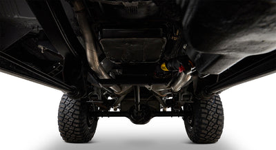 Undercarriage of Classic Ford Bronco showing rear differential, suspension, and tires