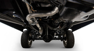 Undercarriage view showing suspension, exhaust, and tires of Classic Ford Bronco