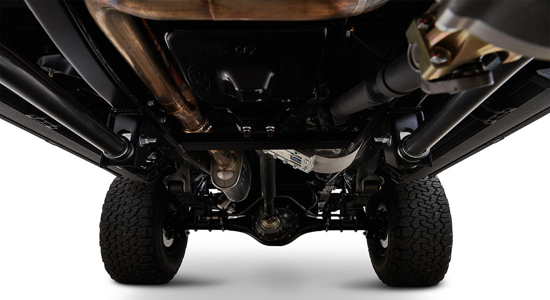 Undercarriage view of Classic Ford Bronco showing exhaust system and suspension