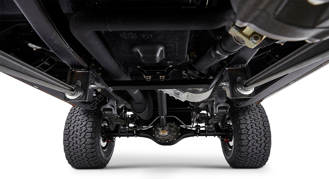 Undercarriage view of Classic Ford Bronco showing suspension and tires