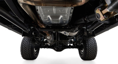 Undercarriage view showing suspension, exhaust system, differential, and tires of Classic Ford Bronco