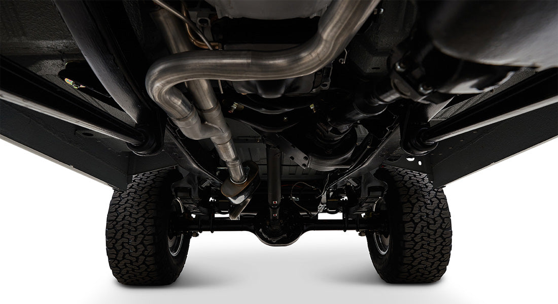 Undercarriage view of a Classic Ford Bronco showing exhaust system and rear axle