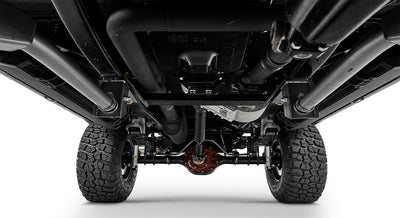 Undercarriage front view of Classic Ford Bronco showing differential, frame, and large off-road tires