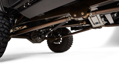 Close-up view of rear suspension, axle and drive components under Classic Ford Bronco