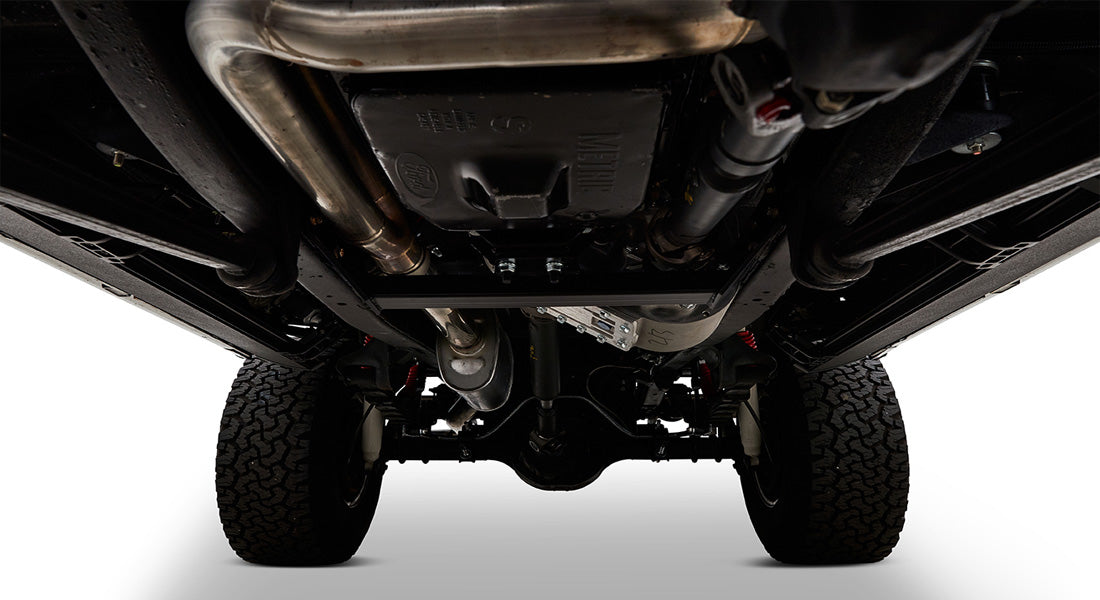 Undercarriage of Classic Ford Bronco showing exhaust and suspension components