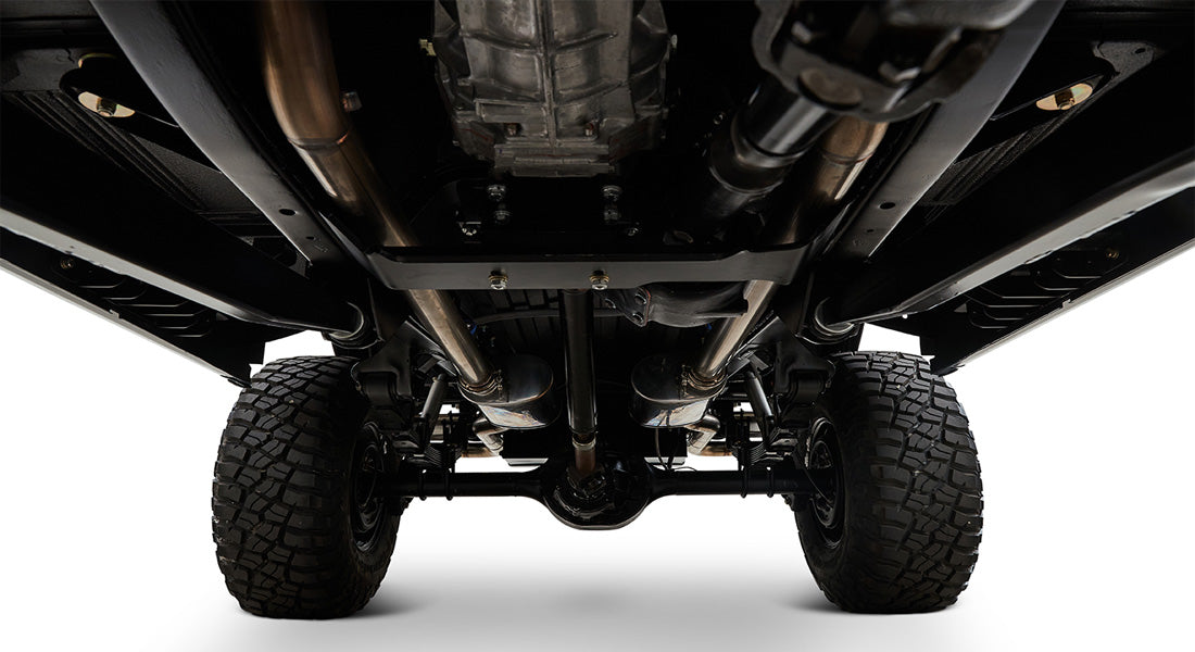 Undercarriage view showing exhaust pipes and suspension of Classic Ford Bronco